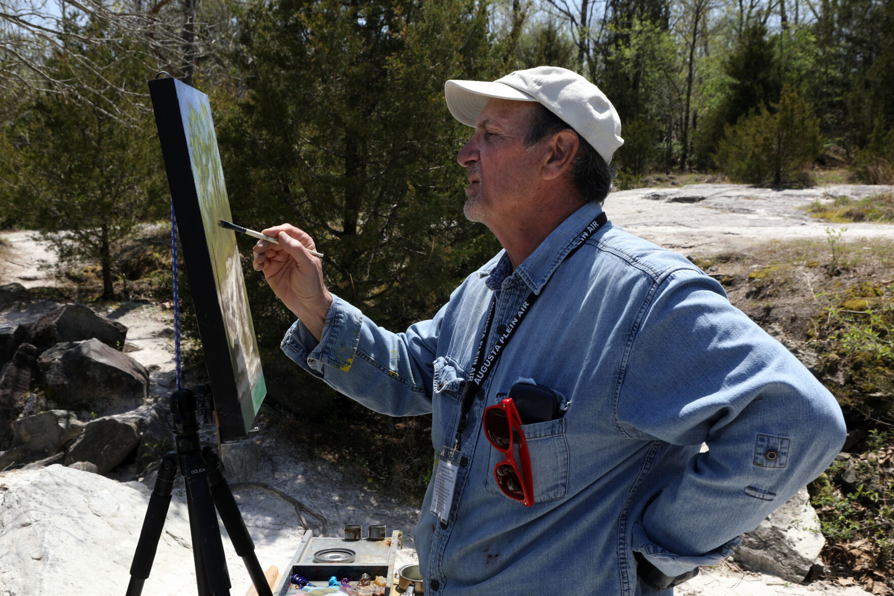 Tony DiMatti contemplates his art